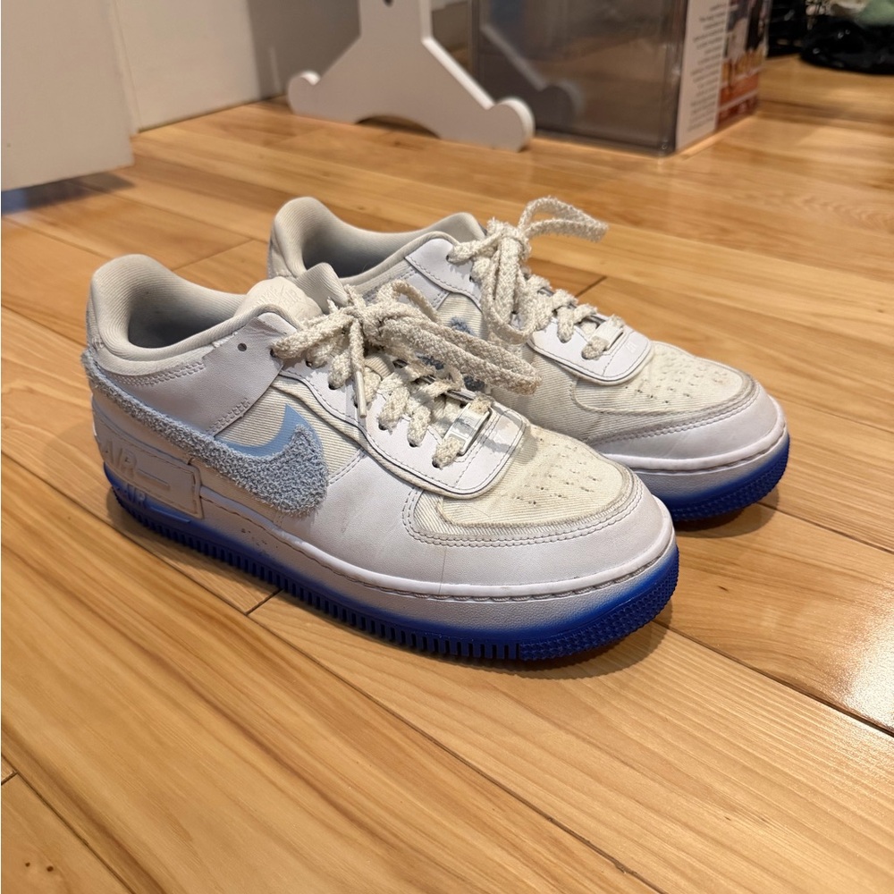 White and Blue Nike sneaker